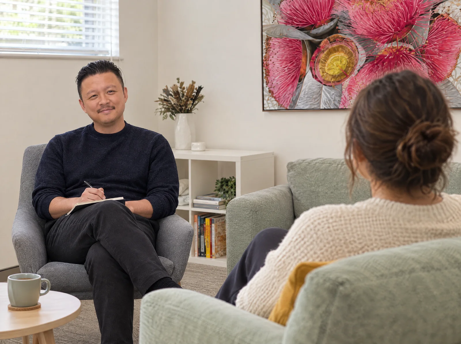 Matthew, one of our provisional psychologists, listens to an adult client.